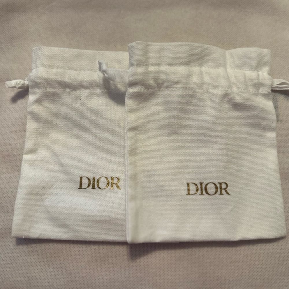 Dior Elegant White Pouches with Gold Logo